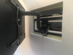 Samsung The Frame TV on recessed Sanus swivel bracket
